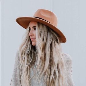 Tan wide brim fall hat with black belt top hat